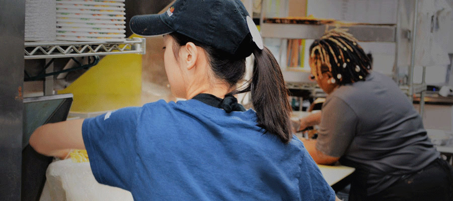 Fazoli's team members in kitchen.